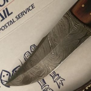 Damascus knife for hunting or cutting cheesecake...